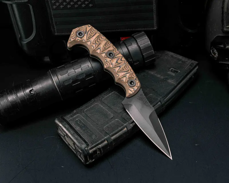 3-Inch Humint Tactical Knife With Tan/Black G10 Scales, Armor Black Cerakote Coating, And Textured Grip 1